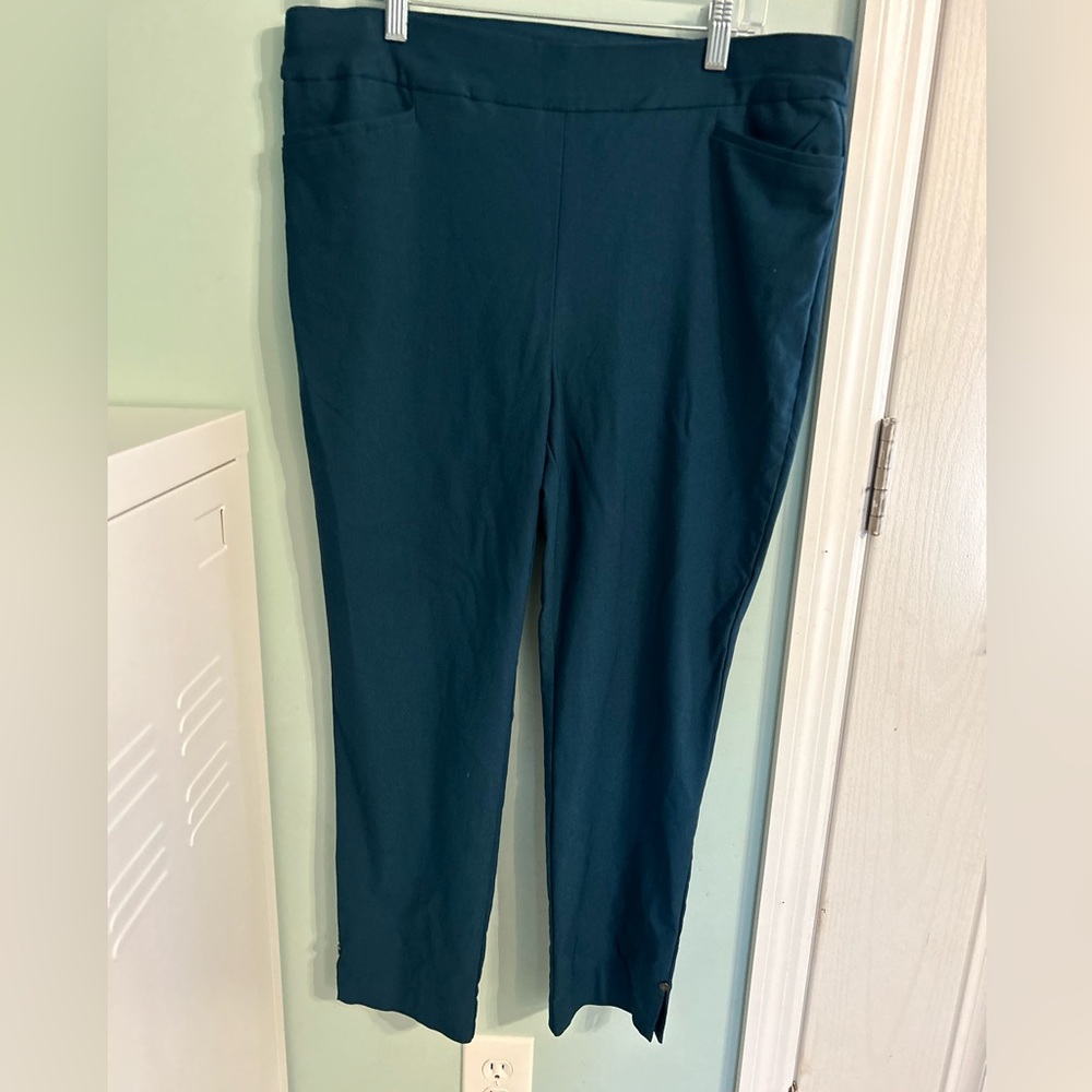 2/$25 Chico’s teal cropped pants. Slit and button detail on cuff.